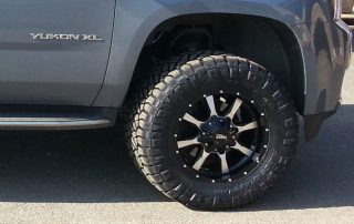 Moto Metal wheels and 33 inch Nitto Ridge Grappler tires